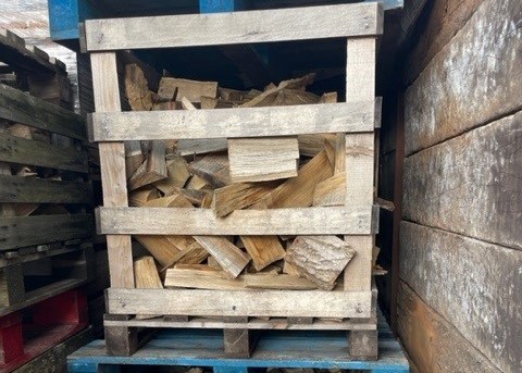 crate of hardwood logs